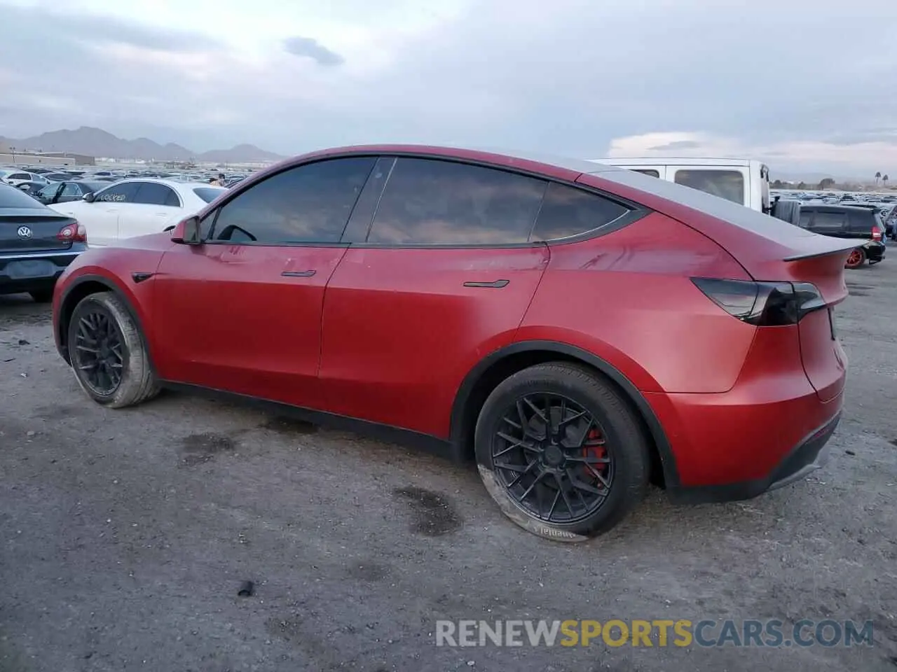 2 fotografías del automóvil dañado 5YJYGDEE3LF011297 TESLA MODEL Y 2020