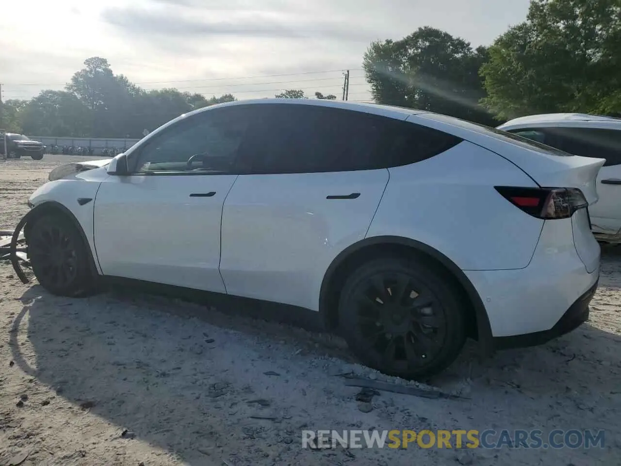 2 fotografías del automóvil dañado 5YJYGDEE3LF012837 TESLA MODEL Y 2020