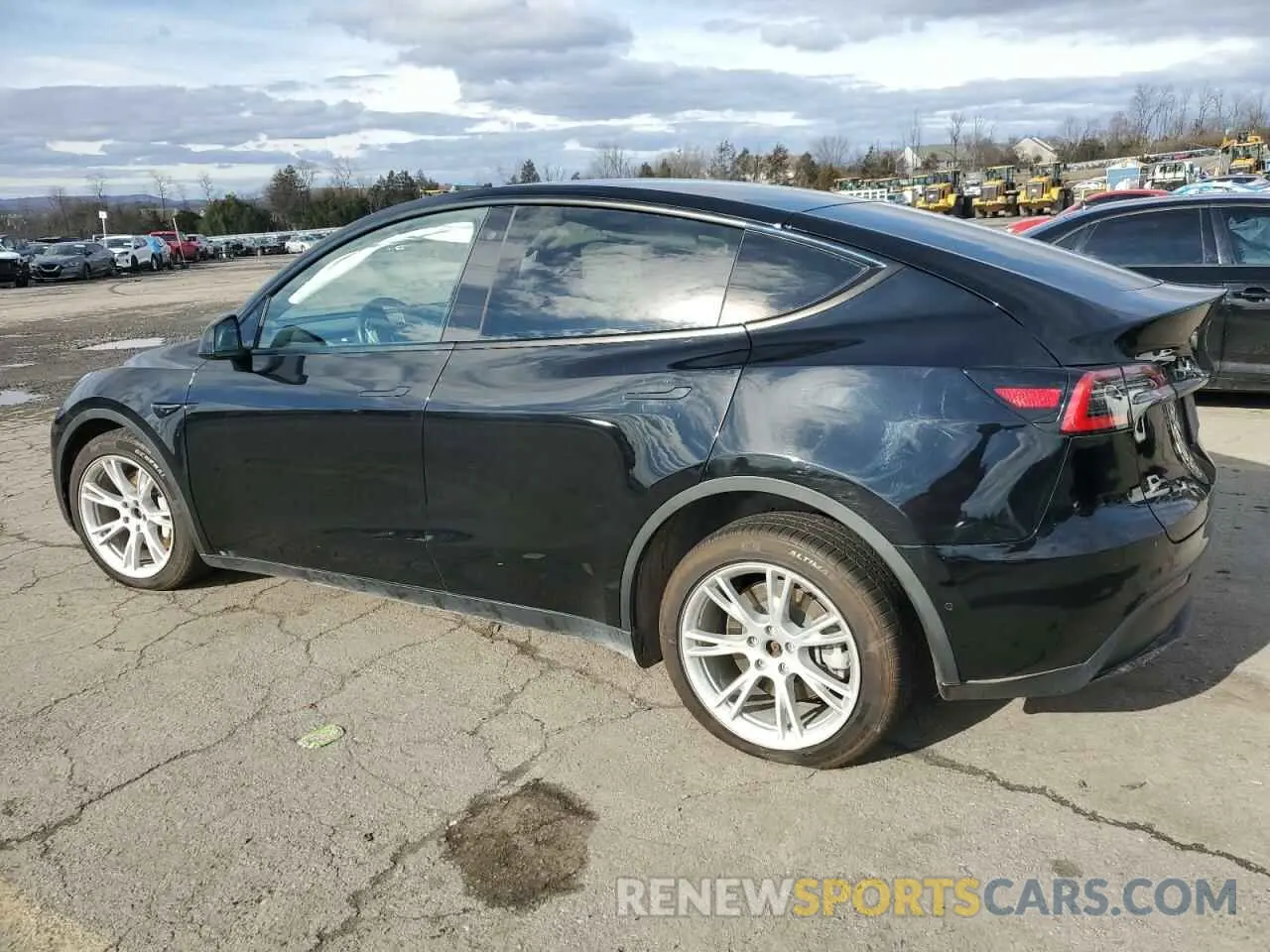 2 fotografías del automóvil dañado 5YJYGDEE4LF038931 TESLA MODEL Y 2020