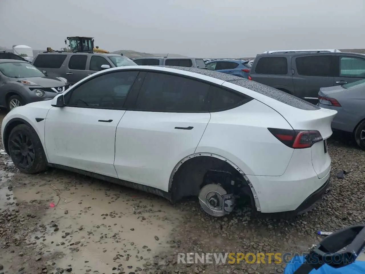2 fotografías del automóvil dañado 5YJYGDEE4LF052702 TESLA MODEL Y 2020