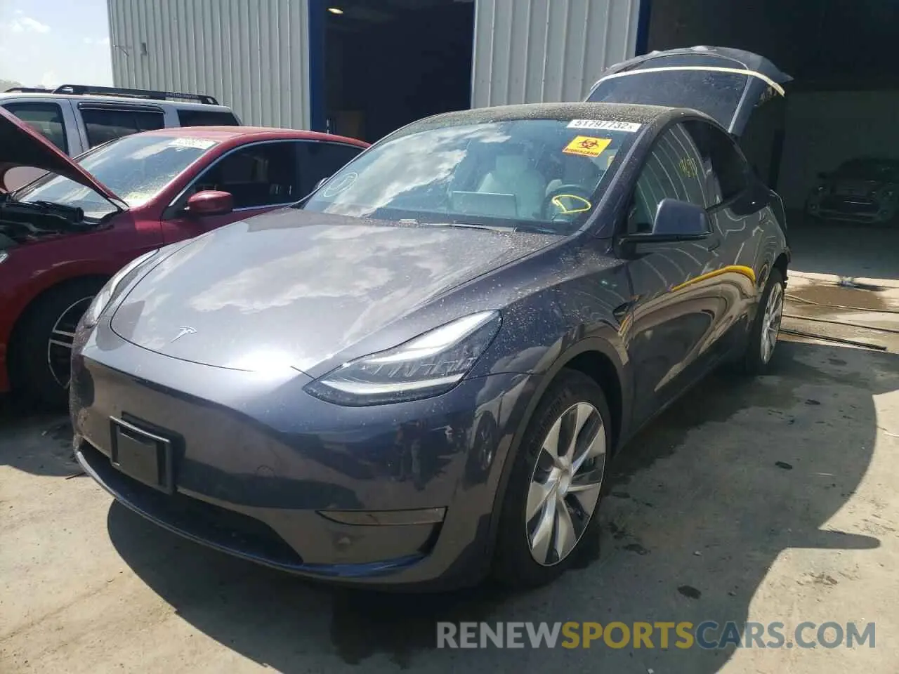 2 fotografías del automóvil dañado 5YJYGDEE6LF044701 TESLA MODEL Y 2020