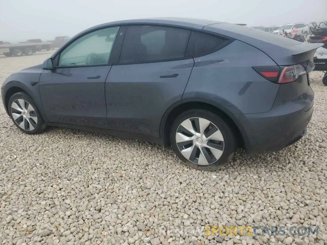 2 fotografías del automóvil dañado 5YJYGDEE8LF031531 TESLA MODEL Y 2020