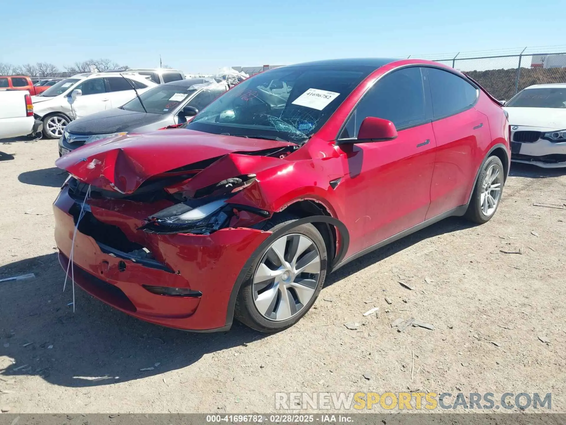 2 fotografías del automóvil dañado 5YJYGDEE9LF009523 TESLA MODEL Y 2020