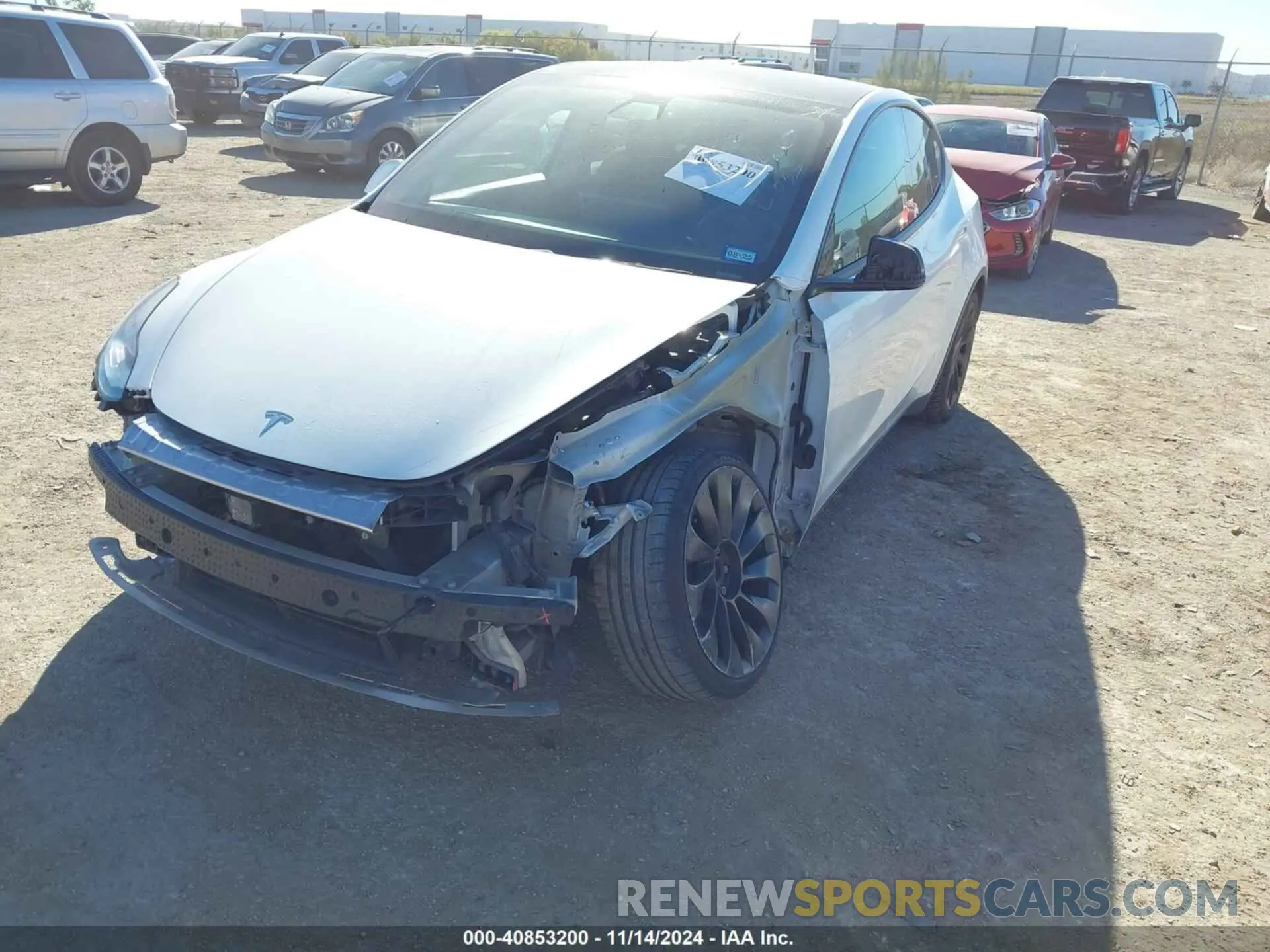 2 fotografías del automóvil dañado 5YJYGDEEXLF027187 TESLA MODEL Y 2020