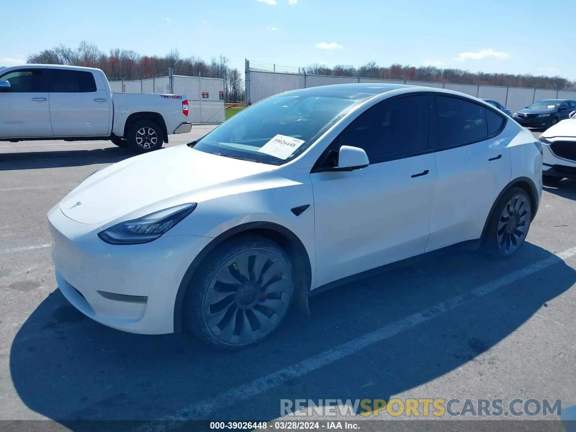 2 fotografías del automóvil dañado 5YJYGDEF0LF011931 TESLA MODEL Y 2020