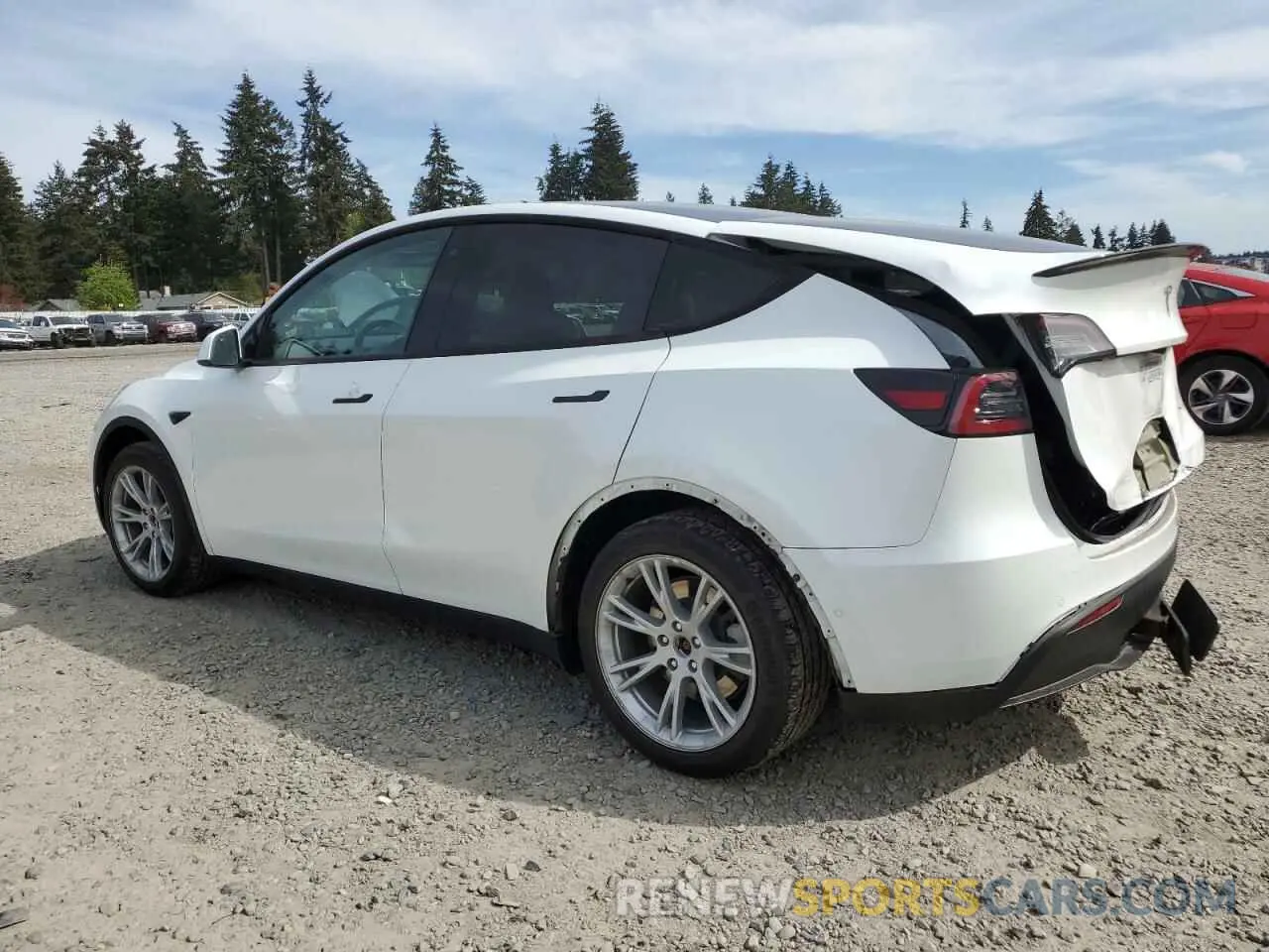 2 fotografías del automóvil dañado 5YJYGDEF2LF006357 TESLA MODEL Y 2020
