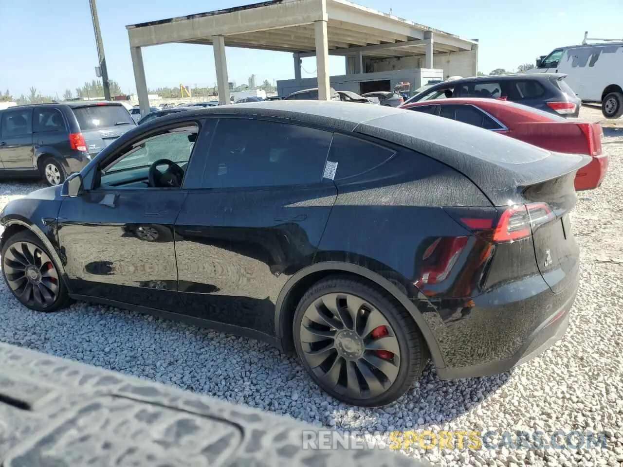 2 fotografías del automóvil dañado 5YJYGDEF2LF049855 TESLA MODEL Y 2020