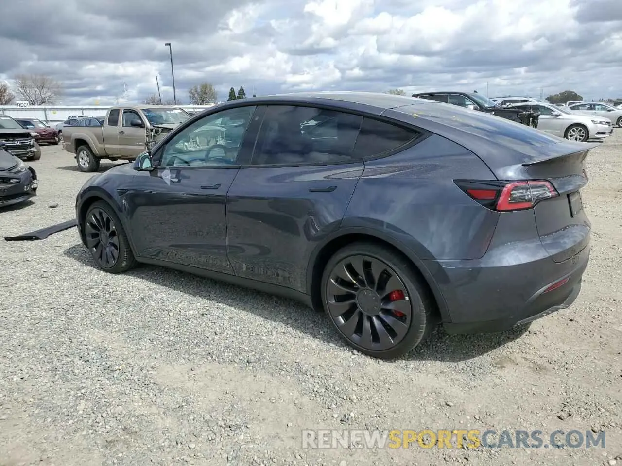 2 fotografías del automóvil dañado 5YJYGDEF3LF016427 TESLA MODEL Y 2020