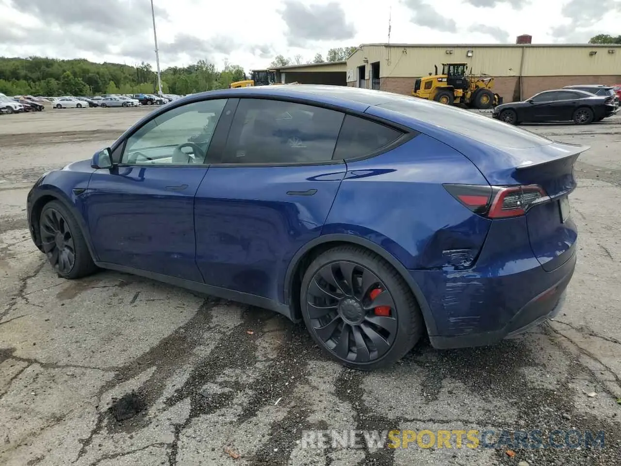 2 fotografías del automóvil dañado 5YJYGDEF7LF000909 TESLA MODEL Y 2020