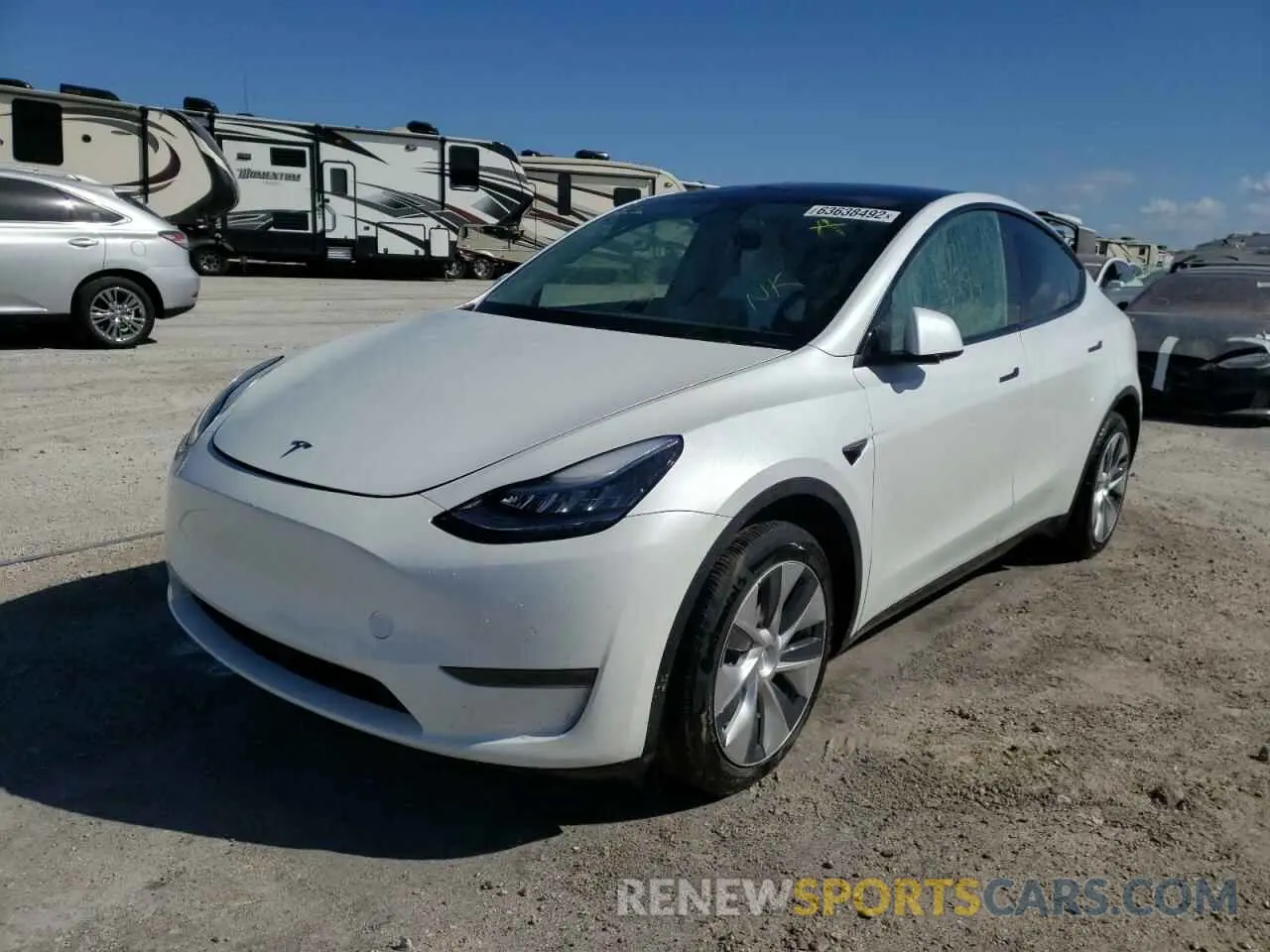 2 fotografías del automóvil dañado 5YJYGDEF8LF018304 TESLA MODEL Y 2020