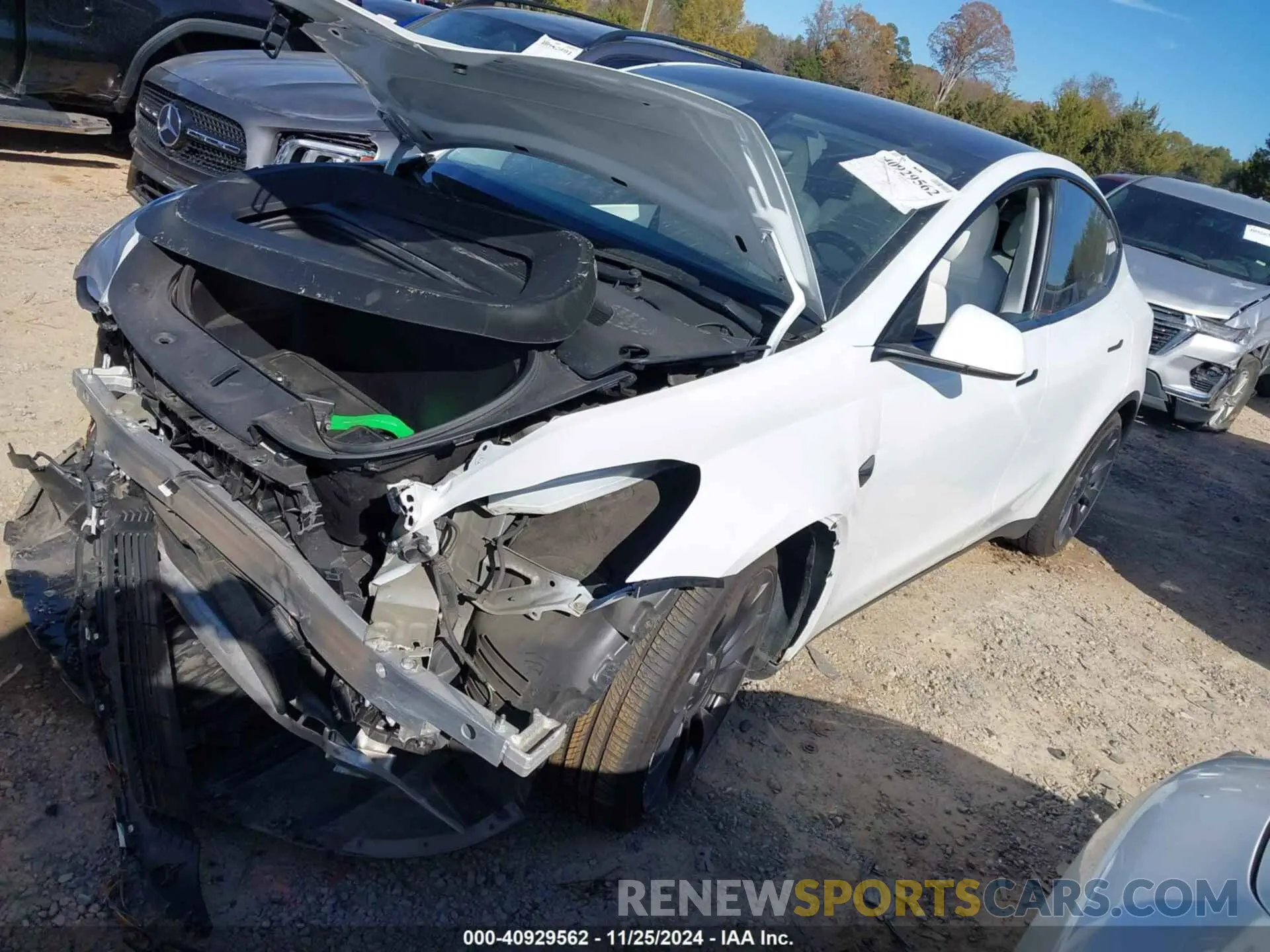 2 fotografías del automóvil dañado 5YJYGDEFXLF011614 TESLA MODEL Y 2020
