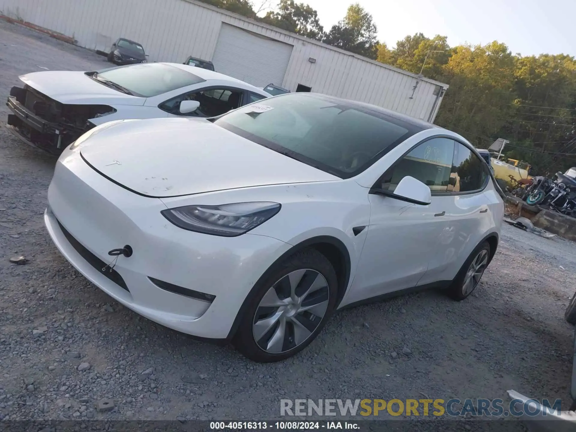 2 fotografías del automóvil dañado 5YJYGAEE0MF188311 TESLA MODEL Y 2021