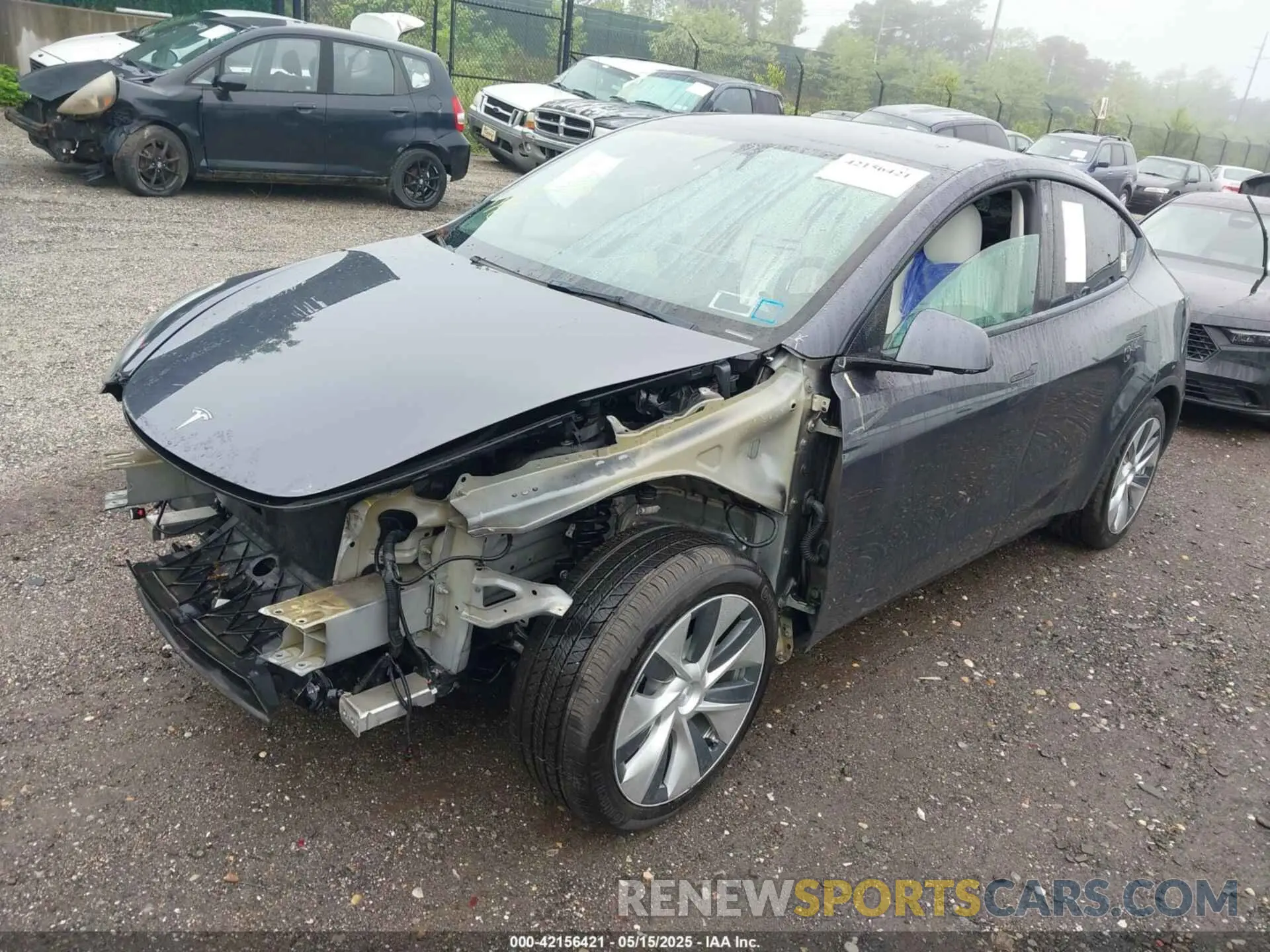 2 fotografías del automóvil dañado 5YJYGAEE1MF145161 TESLA MODEL Y 2021