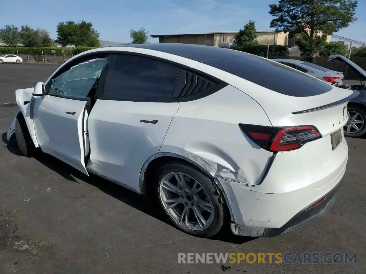 2 fotografías del automóvil dañado 5YJYGAEE1MF305491 TESLA MODEL Y 2021