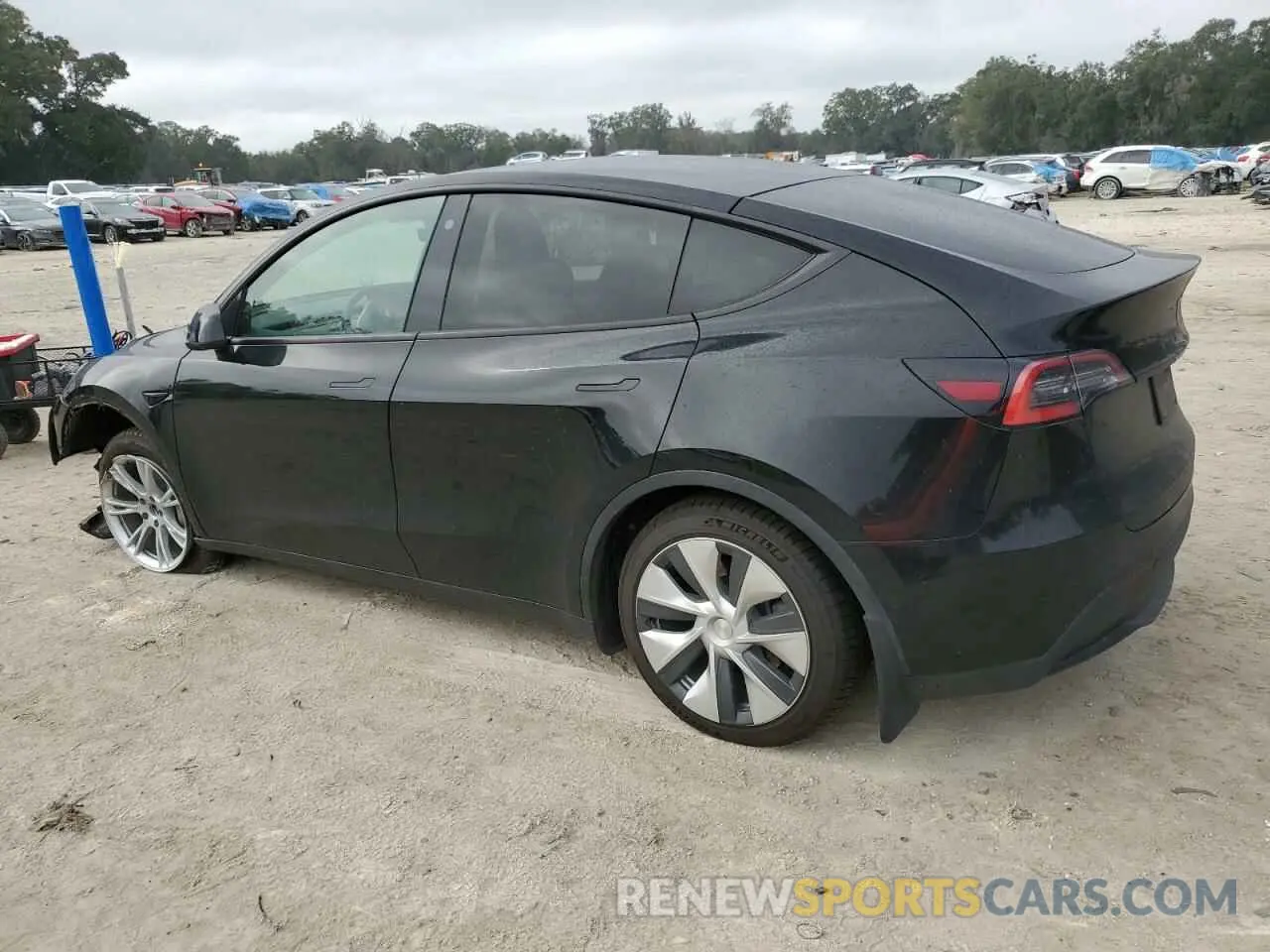 2 fotografías del automóvil dañado 5YJYGAEE3MF130757 TESLA MODEL Y 2021
