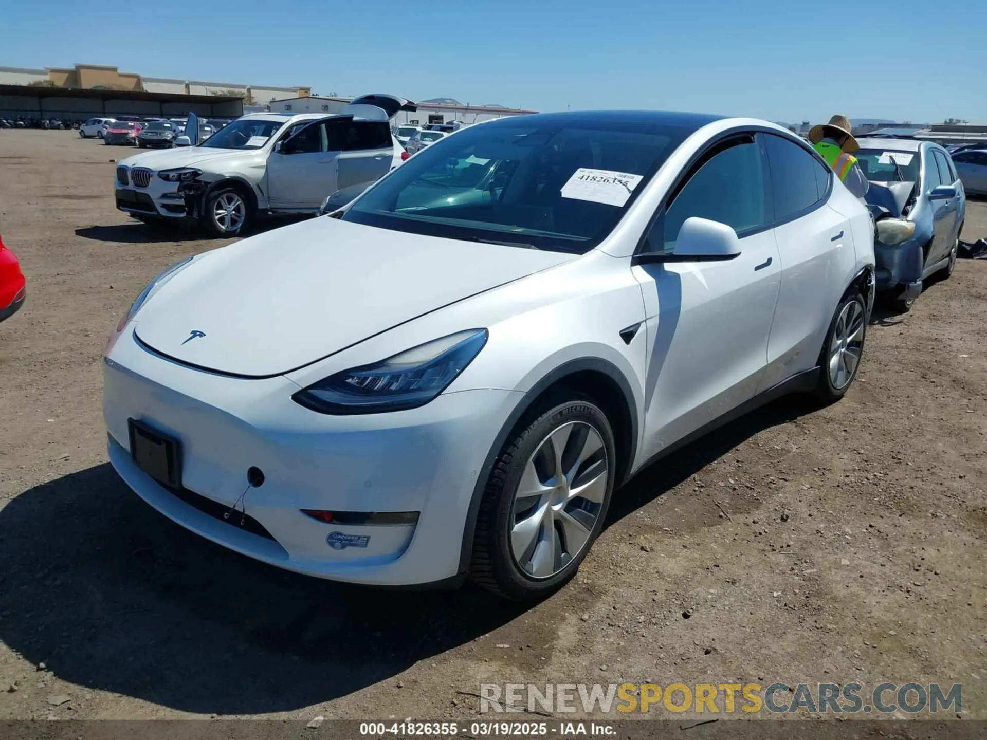 2 fotografías del automóvil dañado 5YJYGAEE3MF172961 TESLA MODEL Y 2021