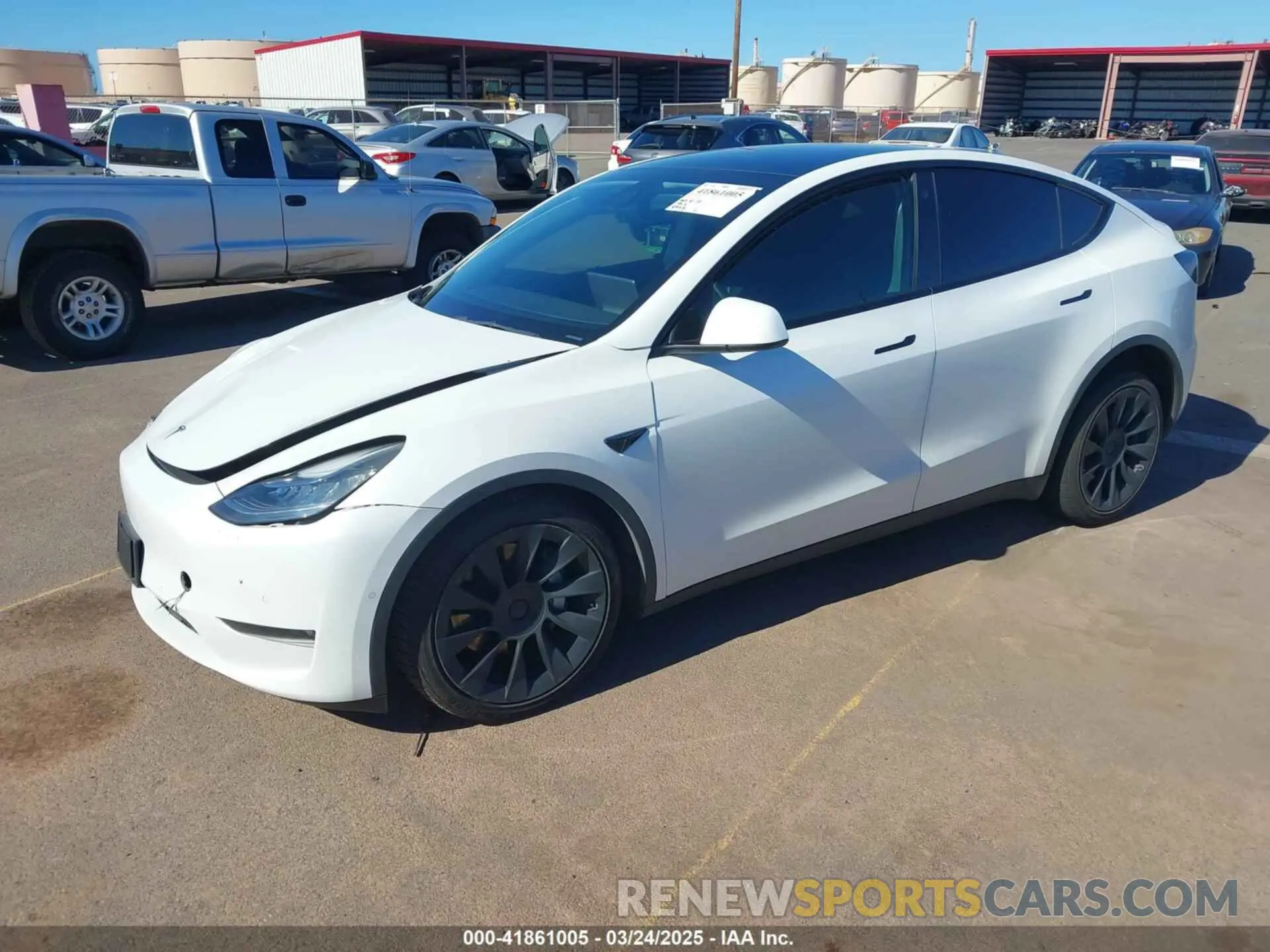 2 fotografías del automóvil dañado 5YJYGAEE3MF194197 TESLA MODEL Y 2021