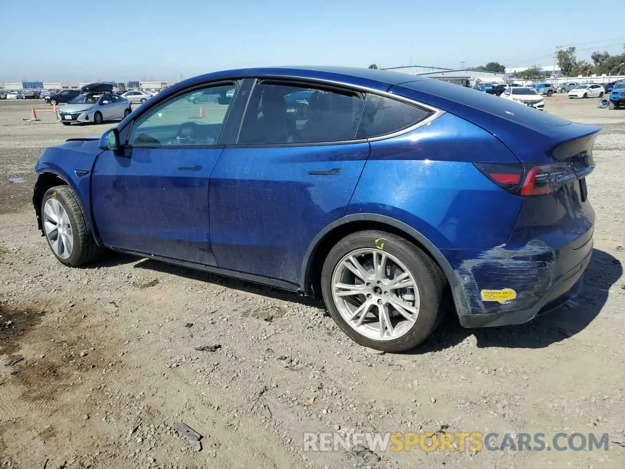 2 fotografías del automóvil dañado 5YJYGAEE3MF231751 TESLA MODEL Y 2021