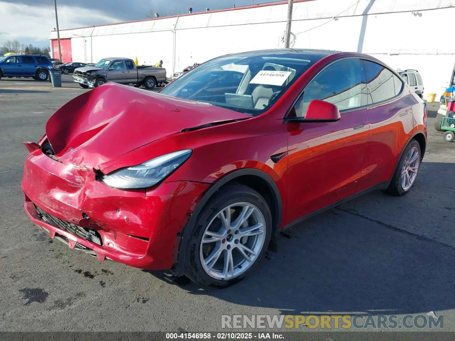 2 fotografías del automóvil dañado 5YJYGAEE4MF131335 TESLA MODEL Y 2021