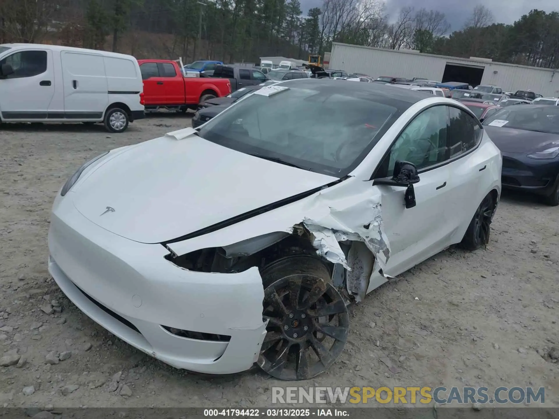 2 fotografías del automóvil dañado 5YJYGAEE4MF225134 TESLA MODEL Y 2021