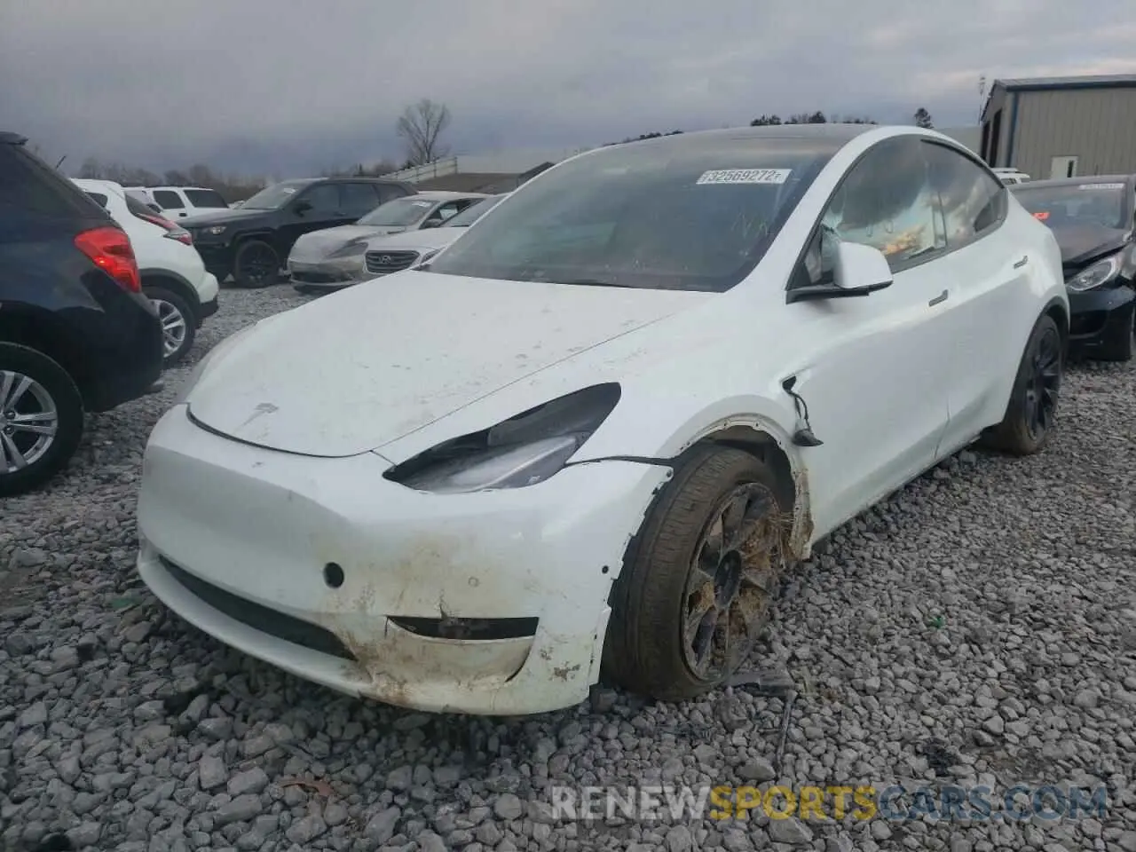 2 fotografías del automóvil dañado 5YJYGAEE4MF257081 TESLA MODEL Y 2021