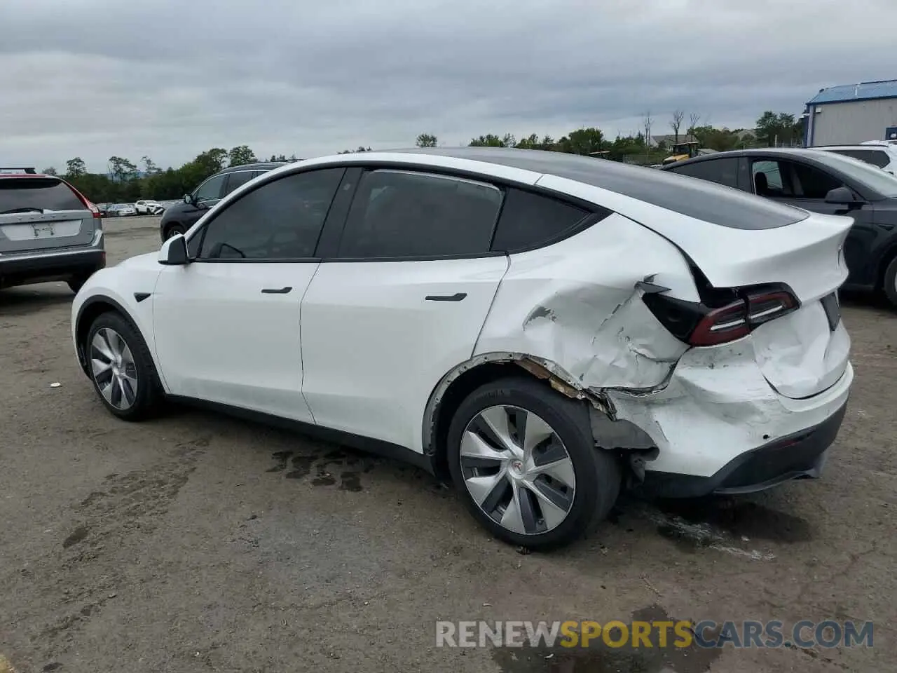 2 fotografías del automóvil dañado 5YJYGAEE4MF297743 TESLA MODEL Y 2021