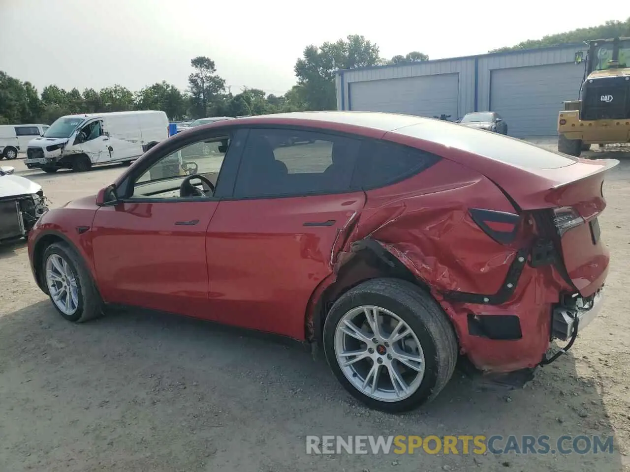 2 fotografías del automóvil dañado 5YJYGAEE5MF141873 TESLA MODEL Y 2021