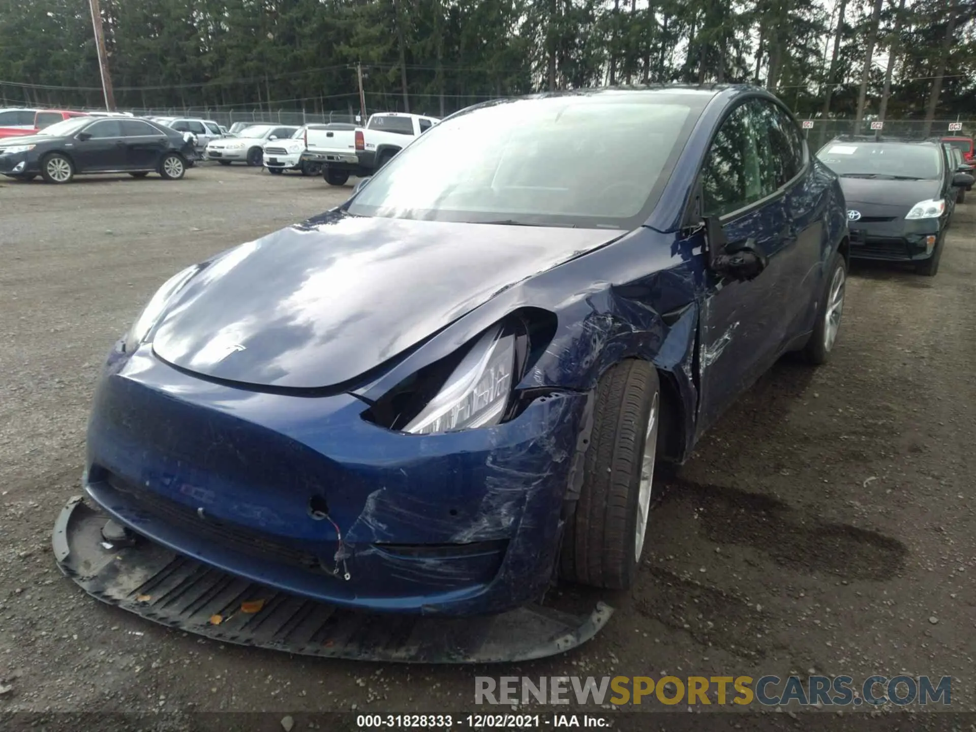 2 fotografías del automóvil dañado 5YJYGAEE7MF172817 TESLA MODEL Y 2021
