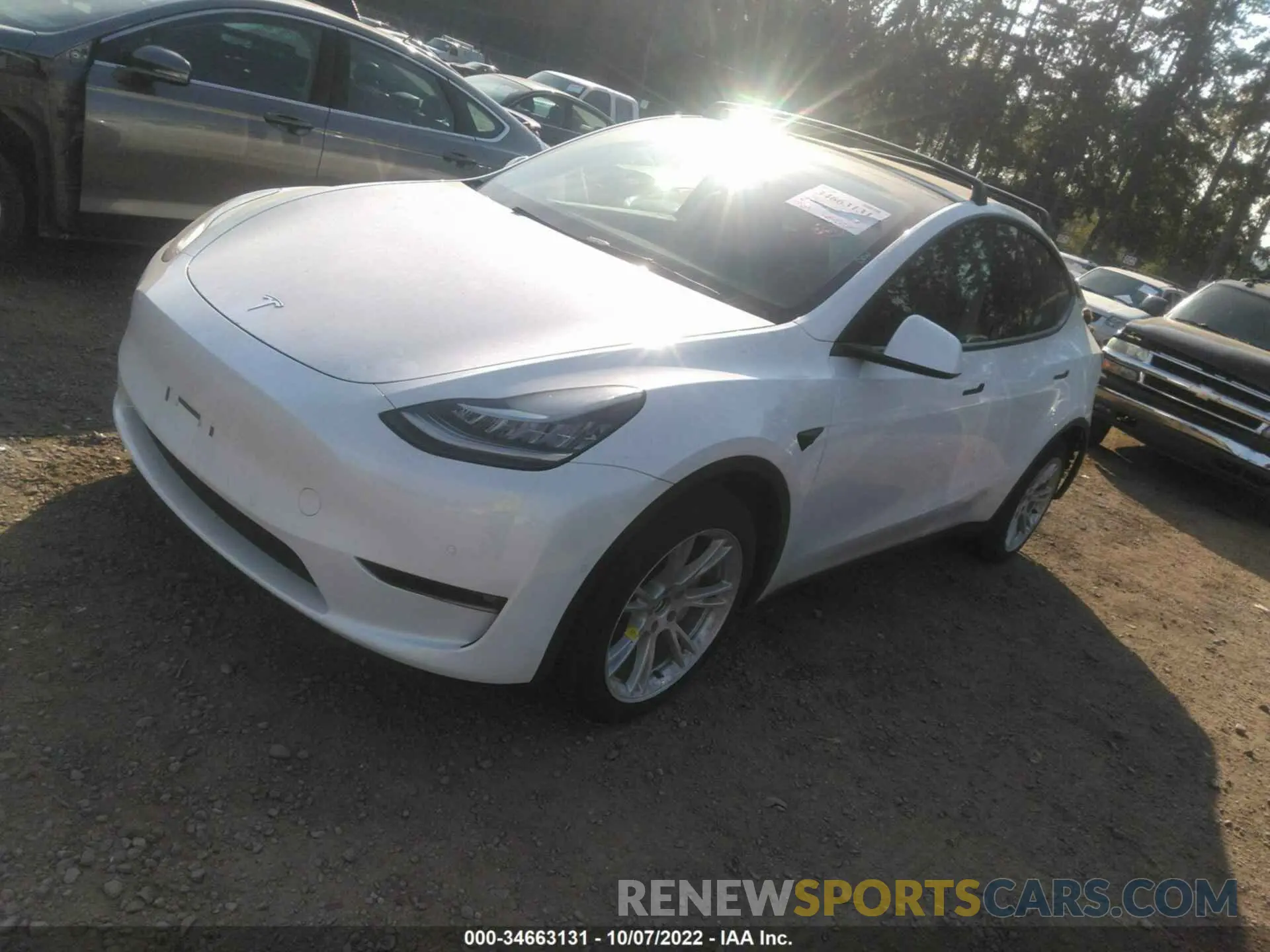 2 fotografías del automóvil dañado 5YJYGAEE7MF237780 TESLA MODEL Y 2021