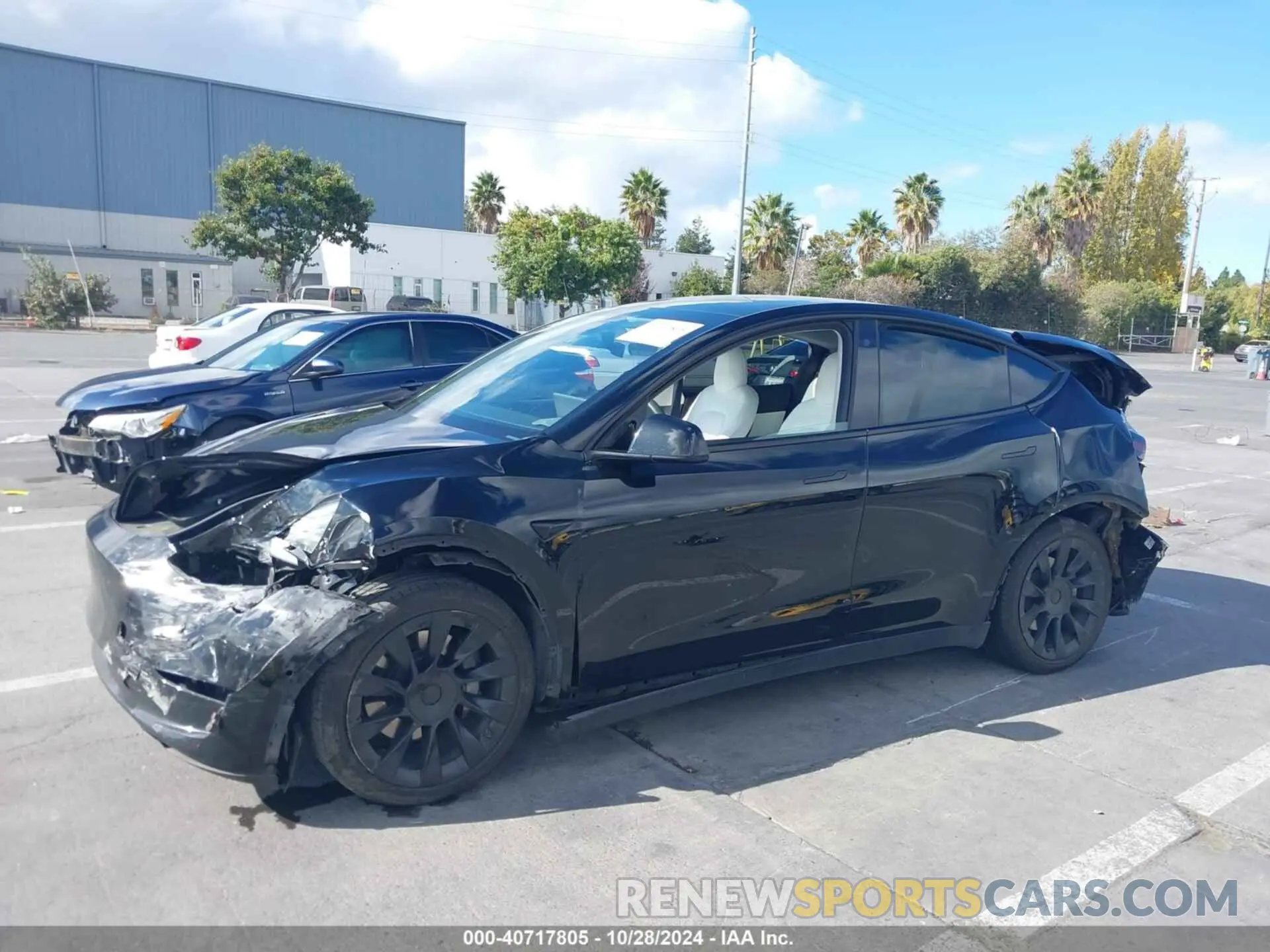 2 fotografías del automóvil dañado 5YJYGAEEXMF244190 TESLA MODEL Y 2021