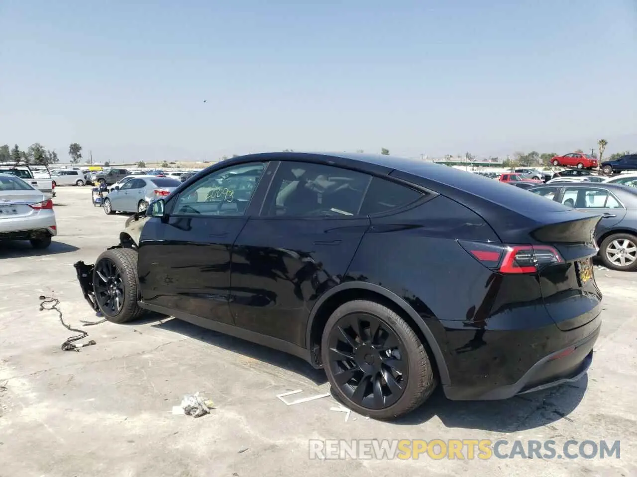 3 fotografías del automóvil dañado 5YJYGDED4MF124166 TESLA MODEL Y 2021