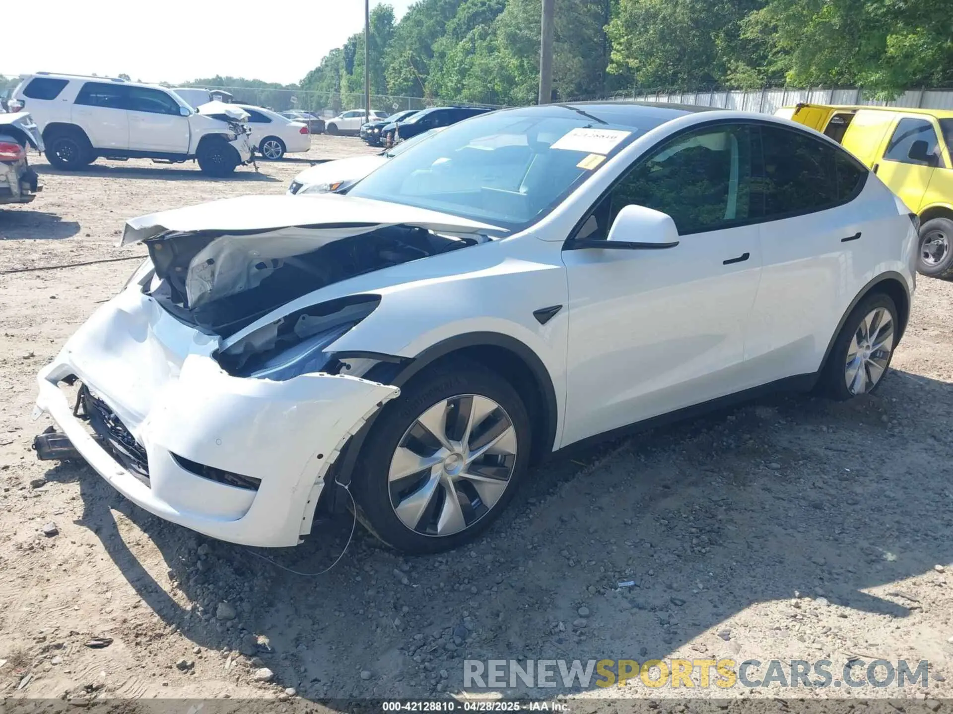 2 fotografías del automóvil dañado 5YJYGDED4MF192824 TESLA MODEL Y 2021