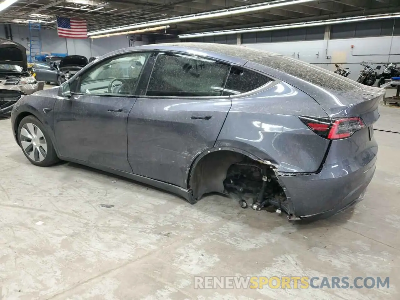 2 fotografías del automóvil dañado 5YJYGDED5MF107781 TESLA MODEL Y 2021