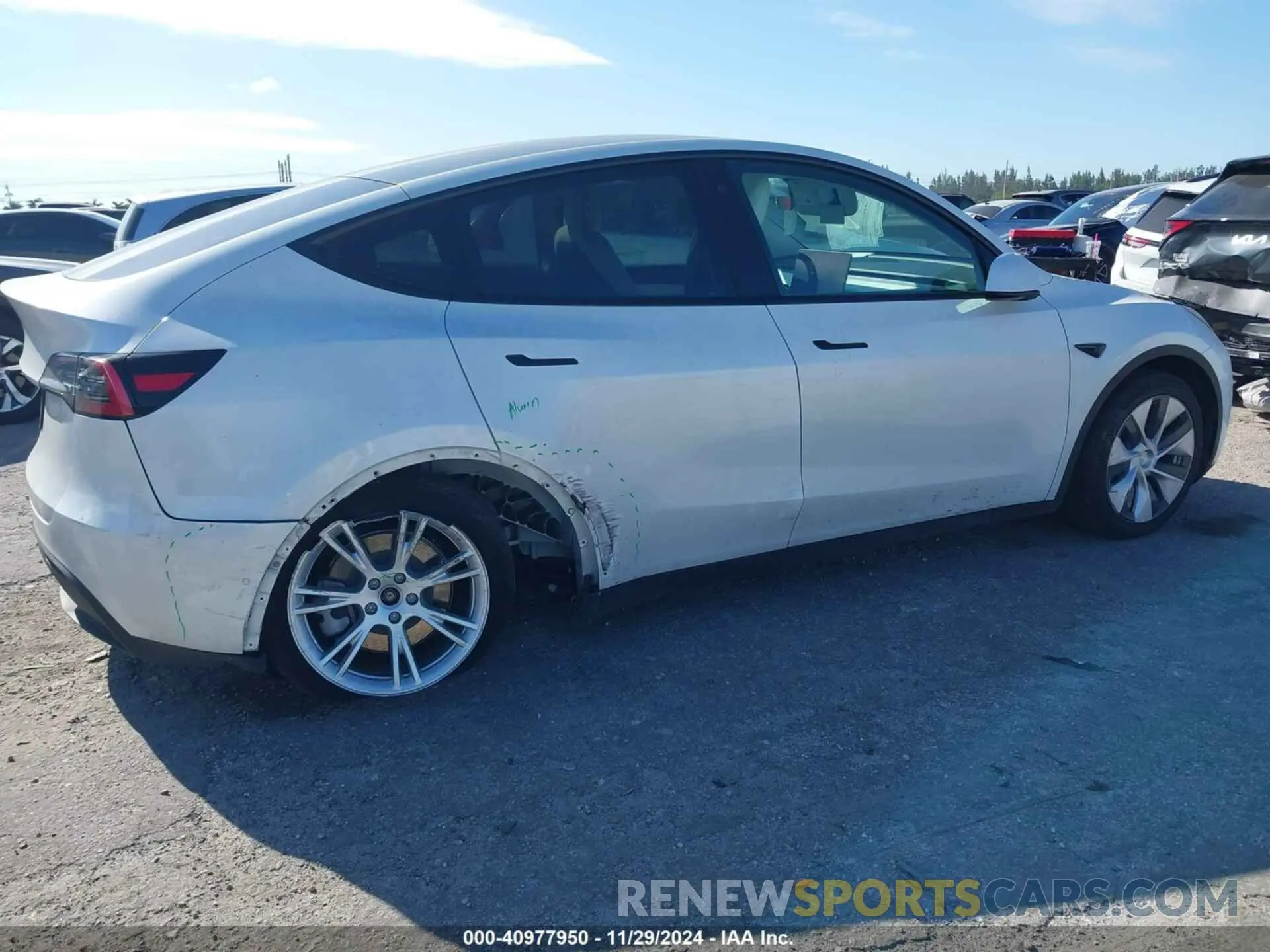 6 fotografías del automóvil dañado 5YJYGDED5MF115203 TESLA MODEL Y 2021