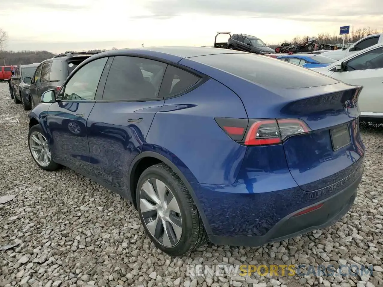 2 fotografías del automóvil dañado 5YJYGDED7MF106342 TESLA MODEL Y 2021