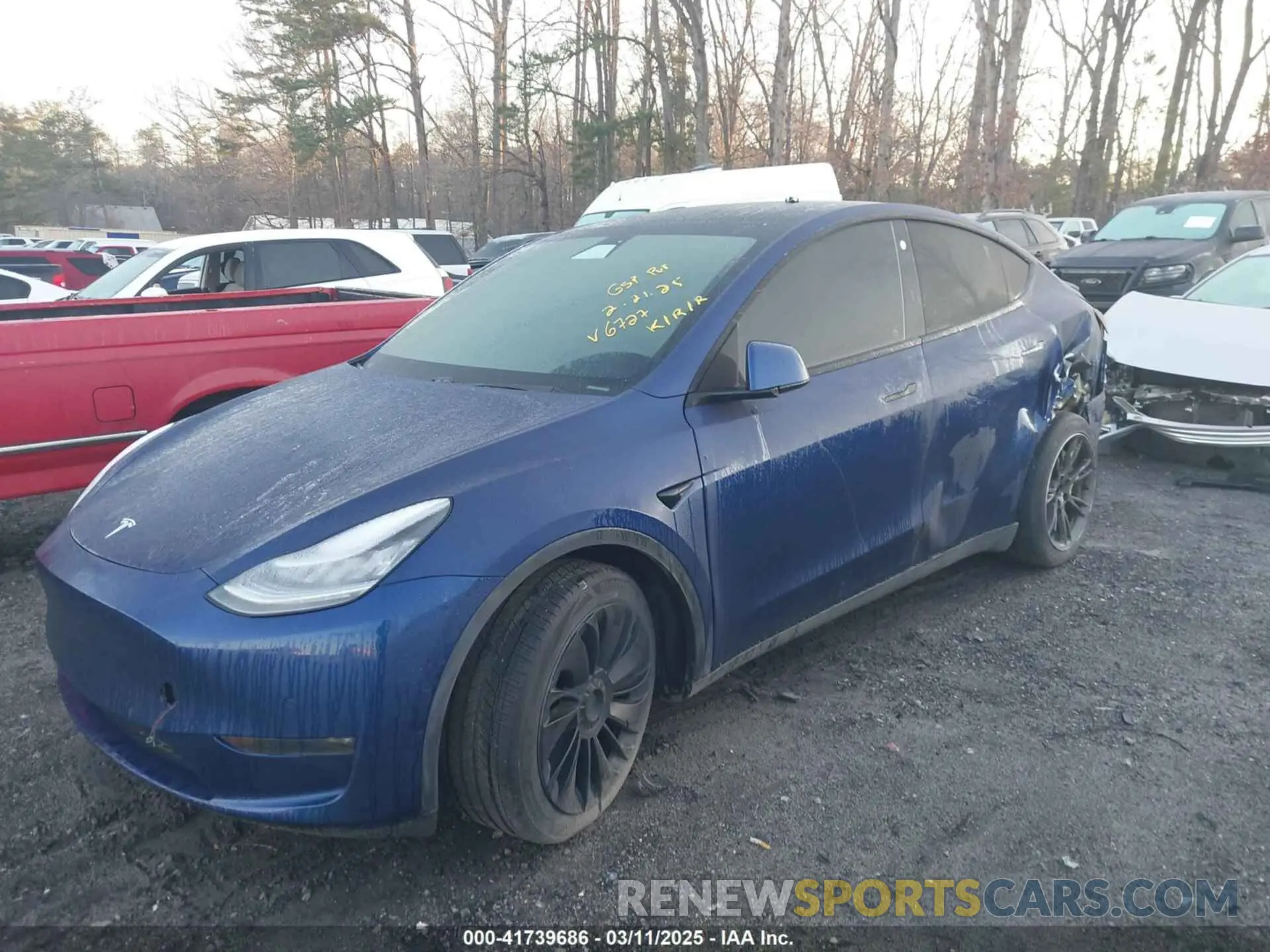 2 fotografías del automóvil dañado 5YJYGDEE0MF066727 TESLA MODEL Y 2021