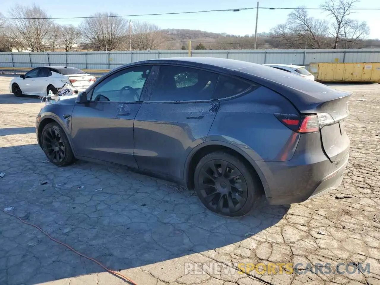 2 fotografías del automóvil dañado 5YJYGDEE0MF088159 TESLA MODEL Y 2021