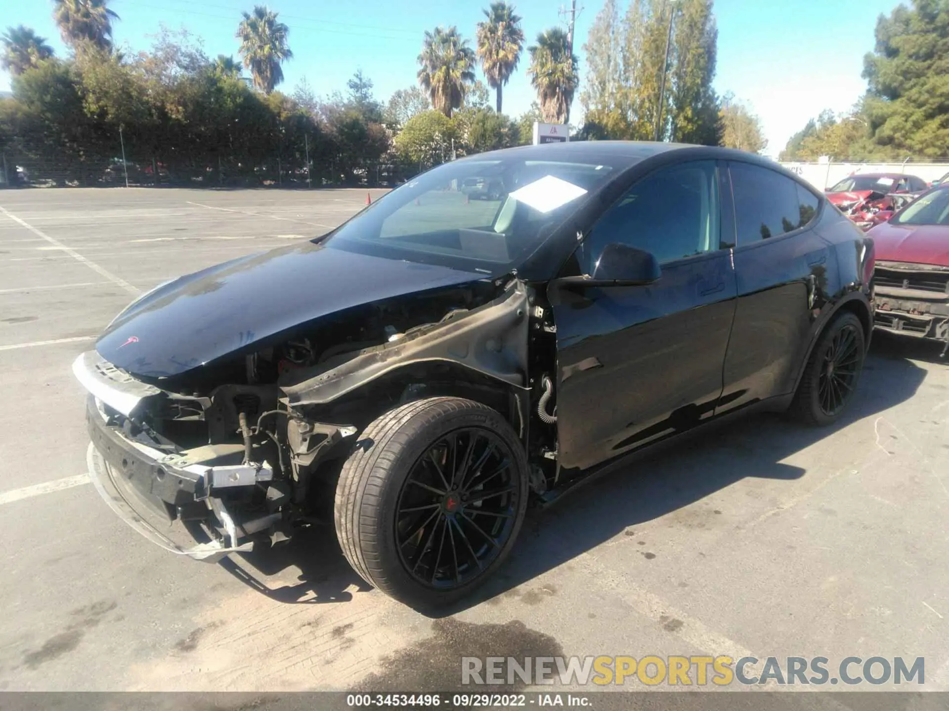 2 fotografías del automóvil dañado 5YJYGDEE0MF099162 TESLA MODEL Y 2021