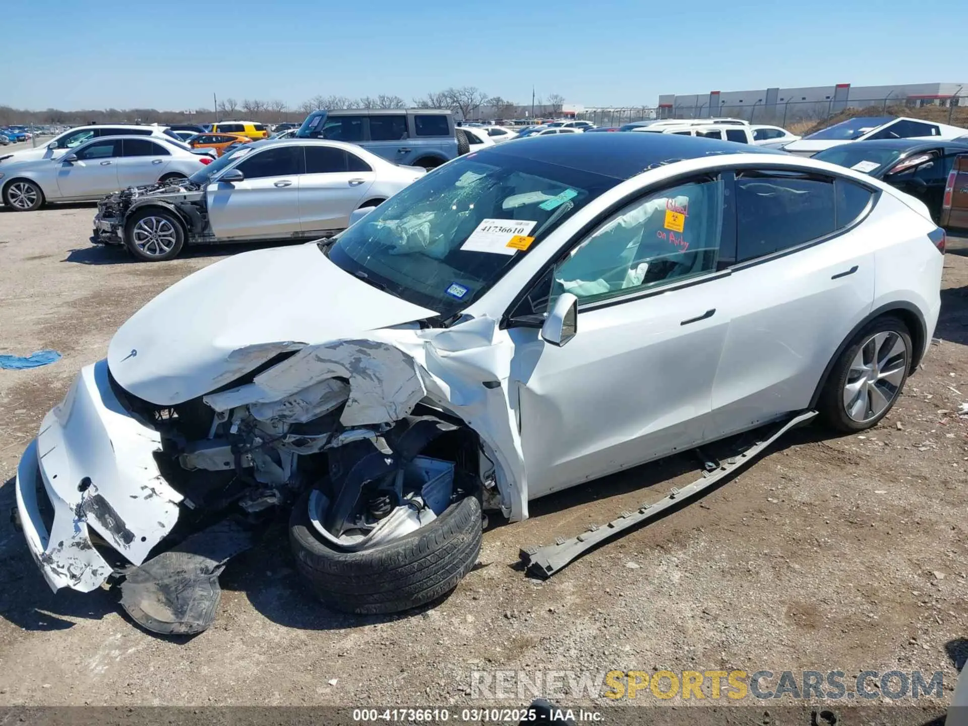 2 fotografías del automóvil dañado 5YJYGDEE0MF106255 TESLA MODEL Y 2021
