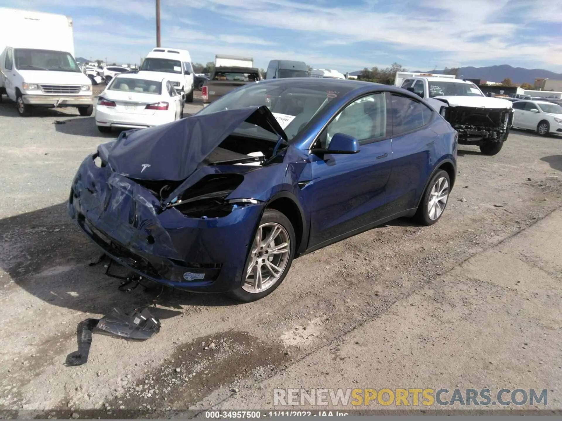 2 fotografías del automóvil dañado 5YJYGDEE0MF158419 TESLA MODEL Y 2021