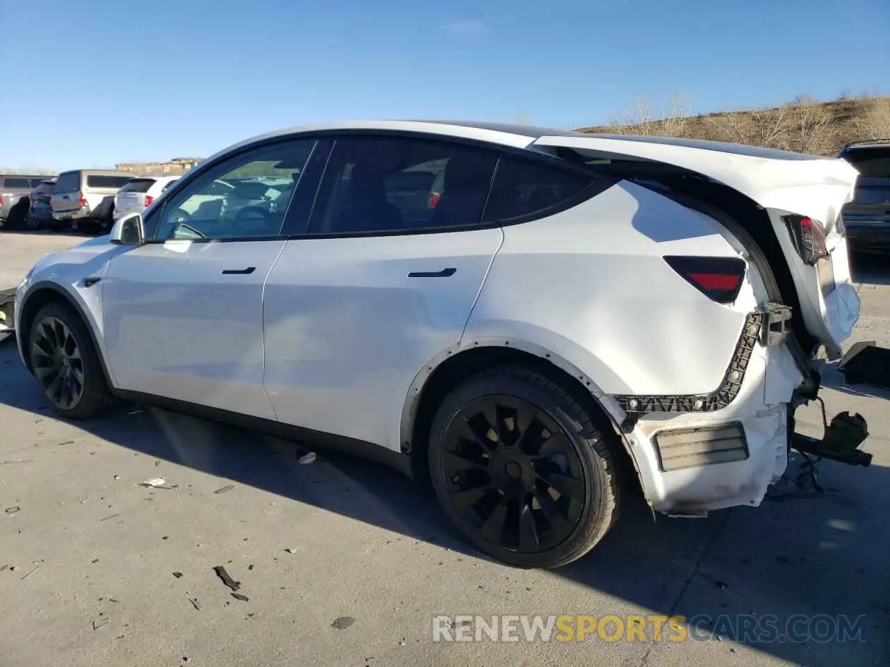 2 fotografías del automóvil dañado 5YJYGDEE0MF185605 TESLA MODEL Y 2021