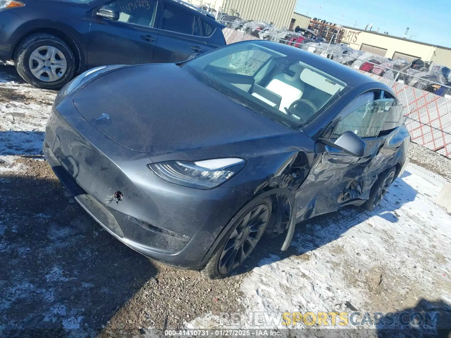 2 fotografías del automóvil dañado 5YJYGDEE0MF228744 TESLA MODEL Y 2021