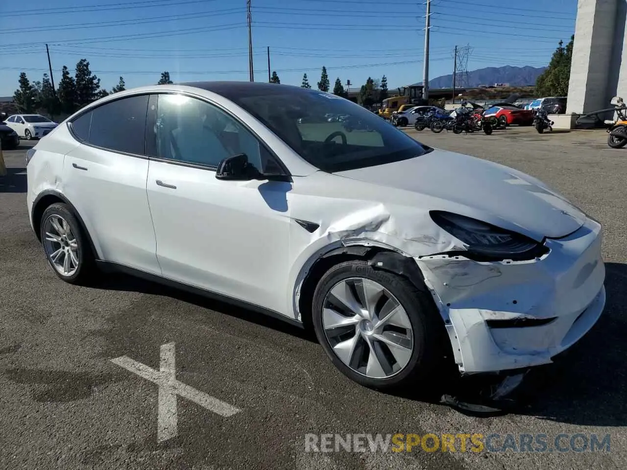 4 fotografías del automóvil dañado 5YJYGDEE0MF274834 TESLA MODEL Y 2021