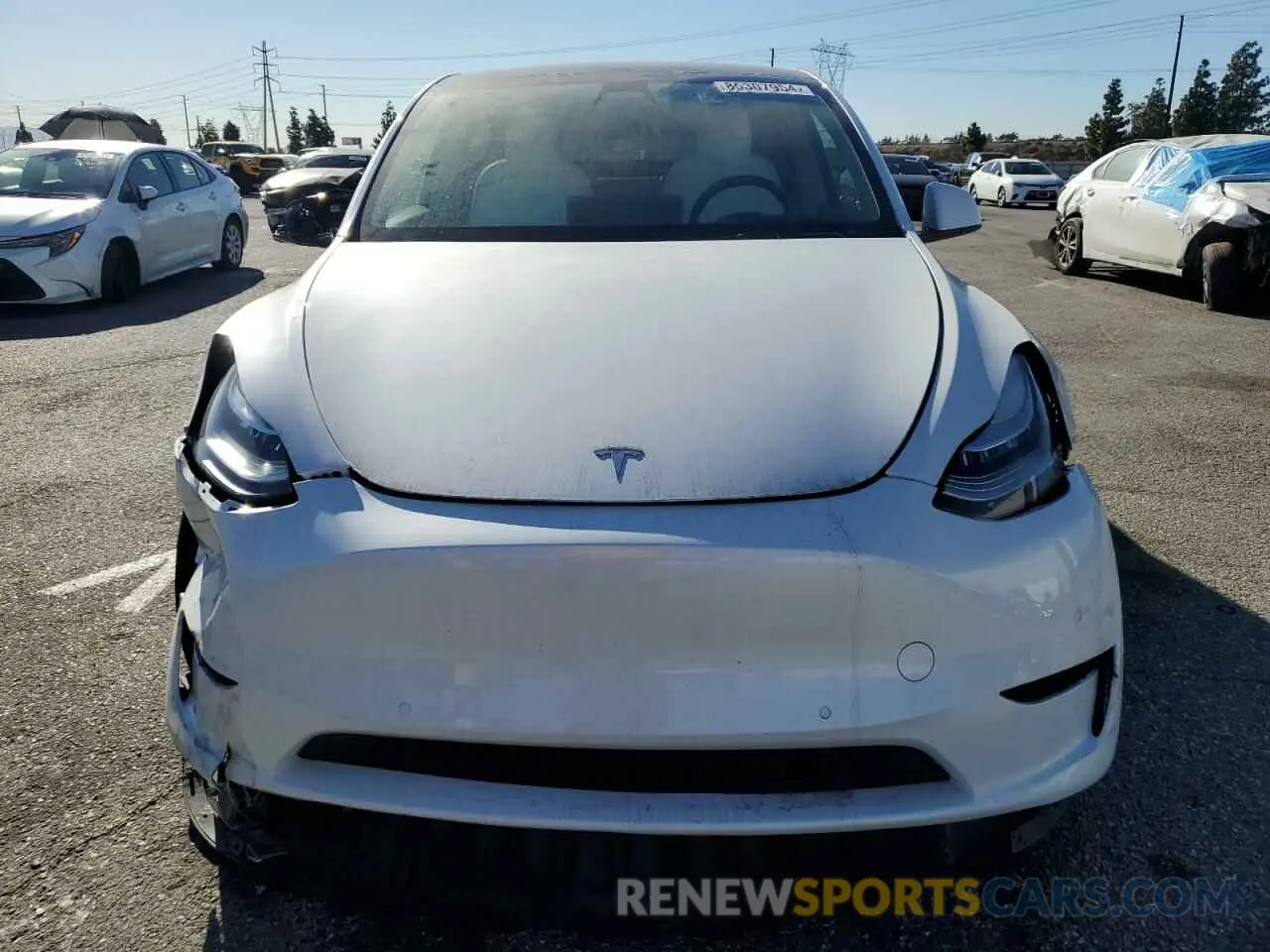 5 fotografías del automóvil dañado 5YJYGDEE0MF274834 TESLA MODEL Y 2021