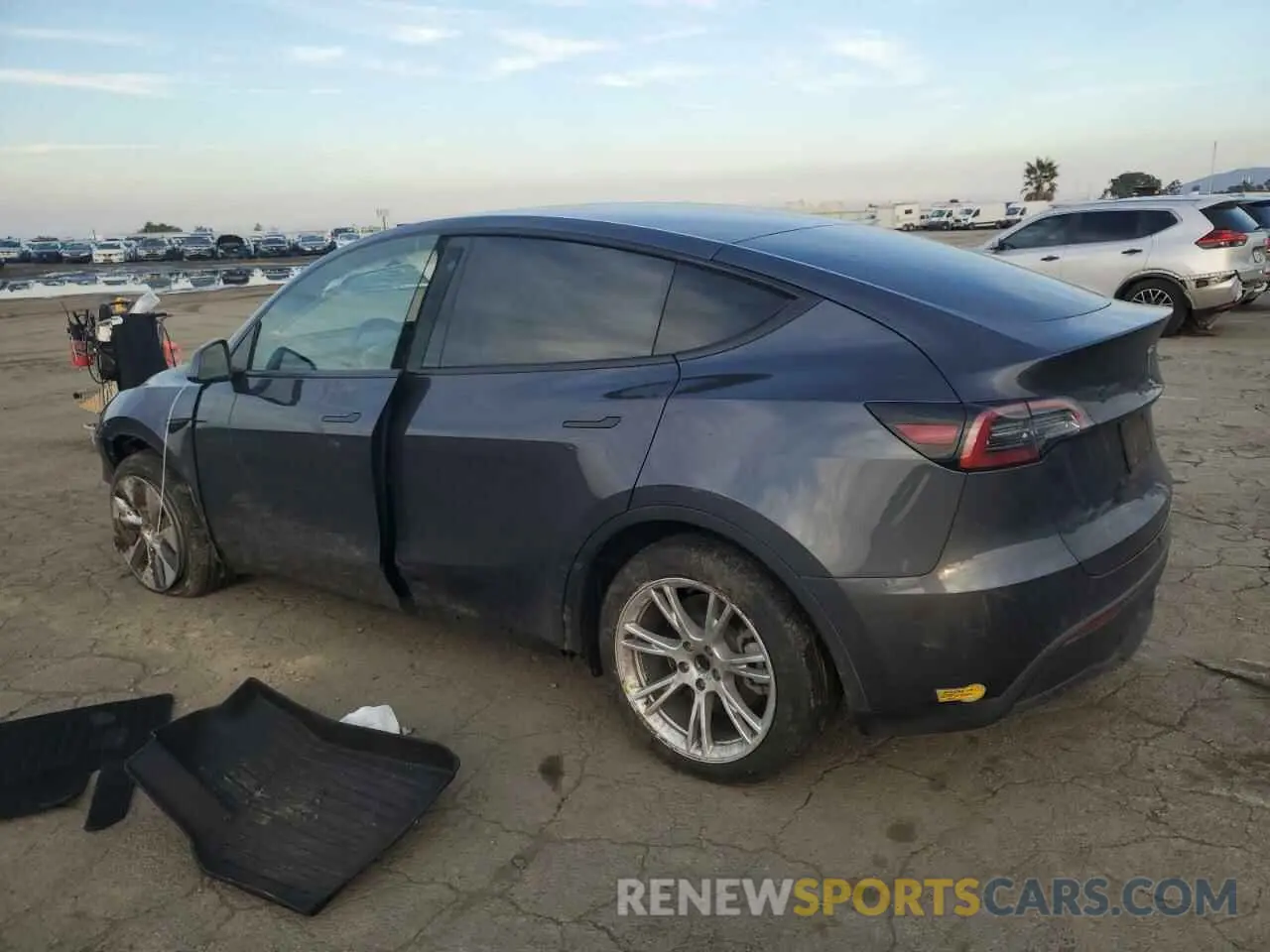 2 fotografías del automóvil dañado 5YJYGDEE0MF278706 TESLA MODEL Y 2021