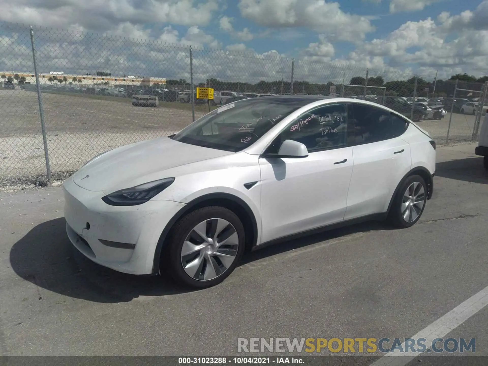 2 fotografías del automóvil dañado 5YJYGDEE1MF066185 TESLA MODEL Y 2021