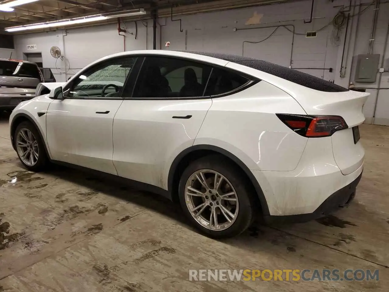 2 fotografías del automóvil dañado 5YJYGDEE1MF068082 TESLA MODEL Y 2021
