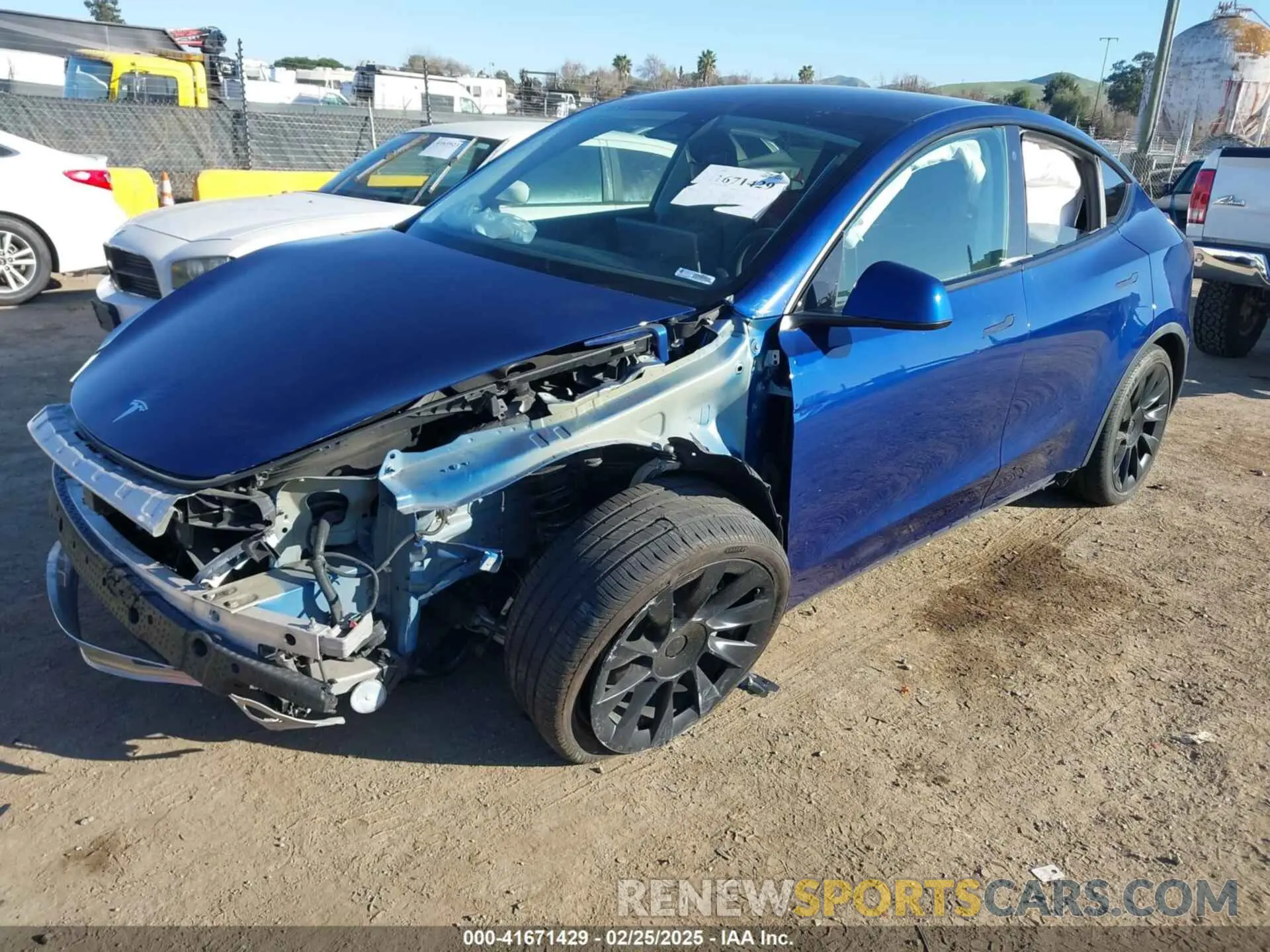 2 fotografías del automóvil dañado 5YJYGDEE1MF070740 TESLA MODEL Y 2021