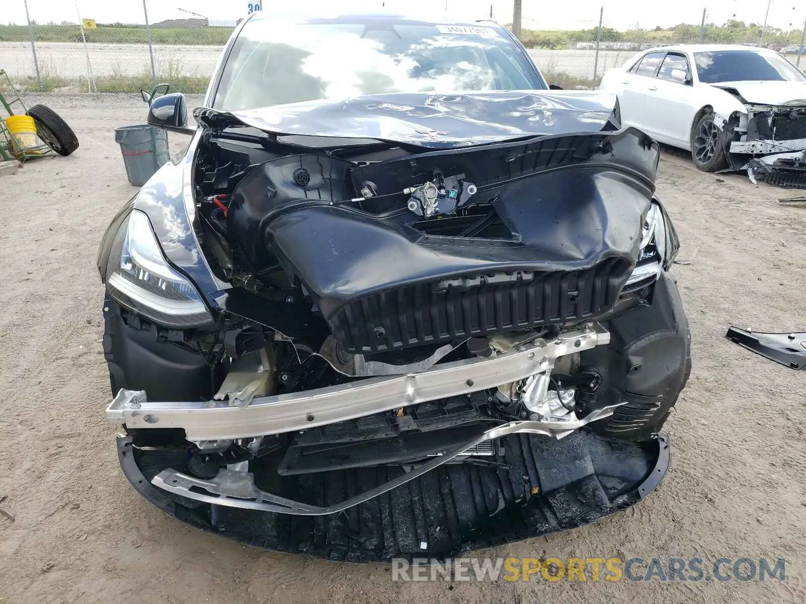 9 fotografías del automóvil dañado 5YJYGDEE1MF083309 TESLA MODEL Y 2021