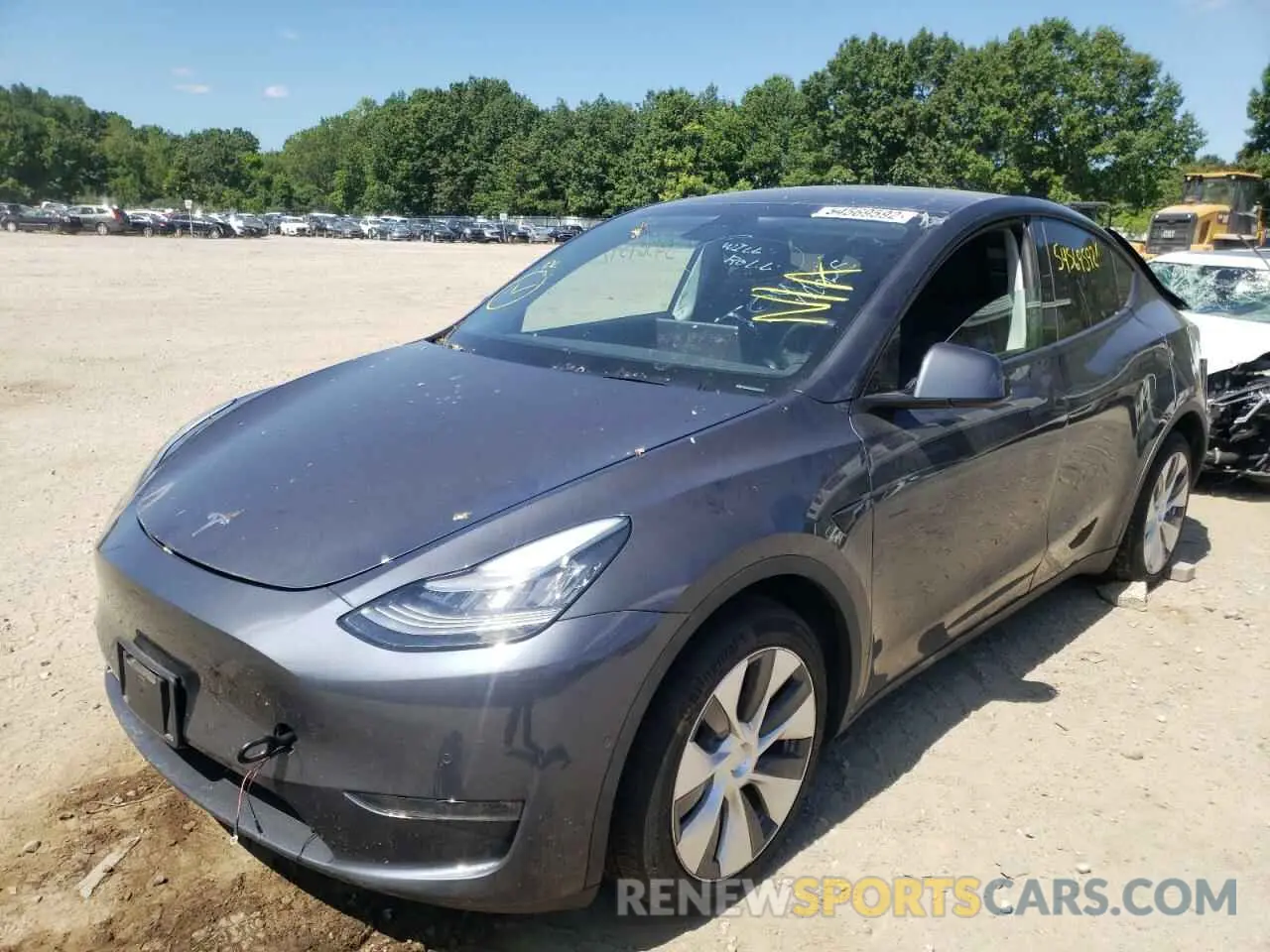 2 fotografías del automóvil dañado 5YJYGDEE1MF086727 TESLA MODEL Y 2021